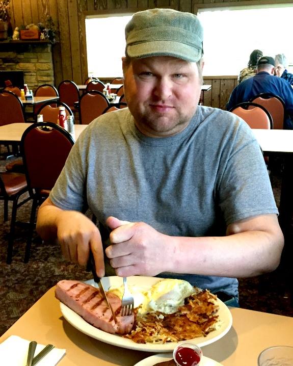 Gabe getting into his damn impressive ham steak at Harner`s in Aurora. — with Gabriel Doman at Harner`s Bakery Restaurant & Catering.