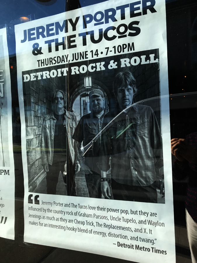 Big poster with a three year old photo, a four year old logo, and a cool caption from Detroit Metro Times — at FairportBside.