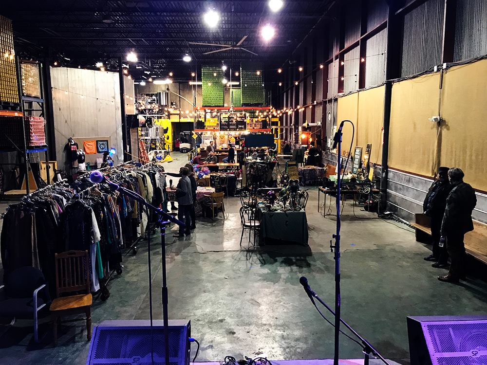 Little Harpeth Brewing in Nashville from the stage at soundcheck as the pop-up clothing market was closing down. — at Little Harpeth.