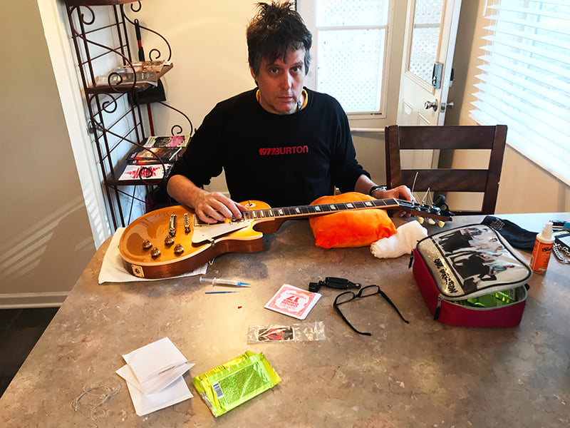 Changing strings on the Les Paul Standard Gold Top at the Airbnb One Direction guitar kit. Don`t judge. Harry Styles is my dude. Photo: Gabriel — with Jeremy Porter in Ralston, Nebraska.