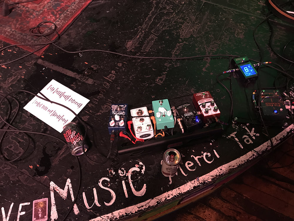 The aftermath - pedals, cables, and setlist drenched in alcohol.