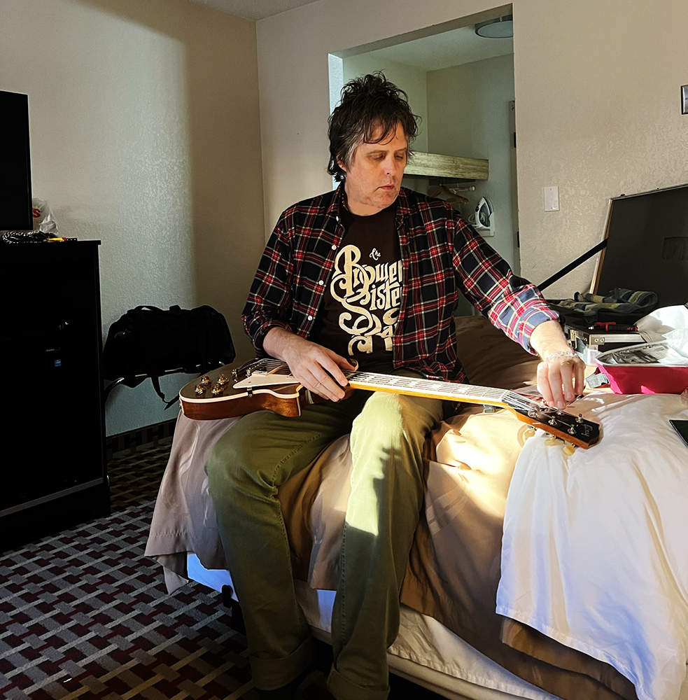 Changing strings on my Les Paul Gold top in a hotel room.