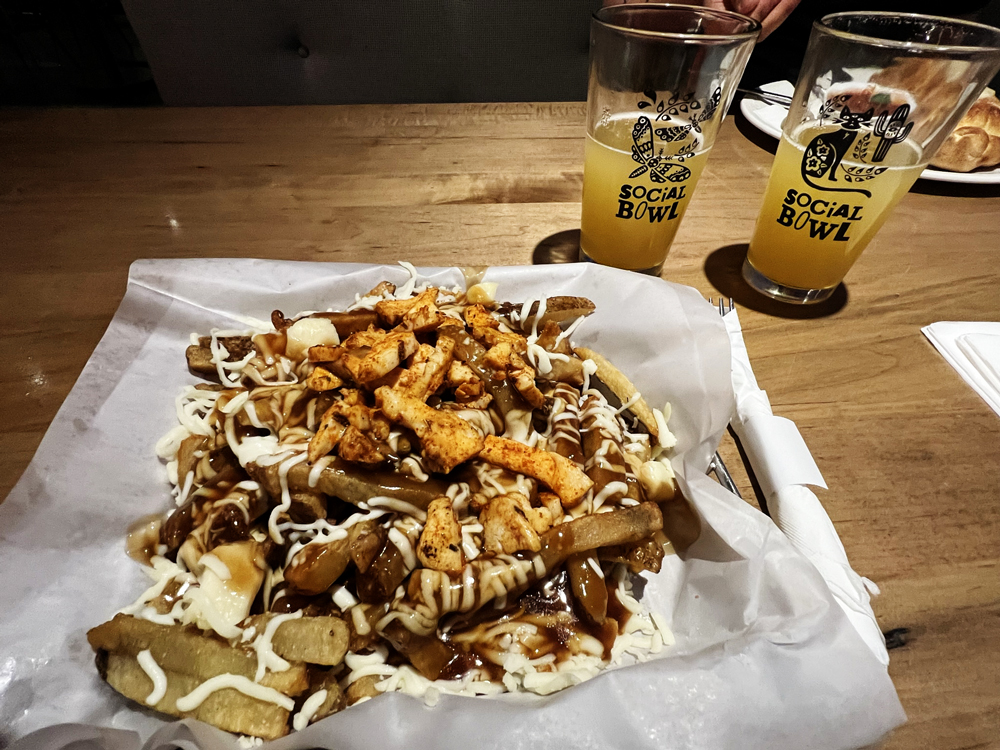 Poutine with chili lime chicken hazy IPA
